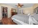 Spacious bedroom with wood flooring and a ceiling fan at 221 111 E St, Bradenton, FL 34212