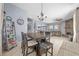 Bright dining area with a rustic wooden table at 221 111 E St, Bradenton, FL 34212