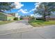 Two-story house with a long driveway and basketball hoop at 221 111 E St, Bradenton, FL 34212