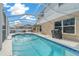 Large pool with spacious deck and covered patio at 221 111 E St, Bradenton, FL 34212