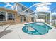 Inviting pool with patio and screened enclosure at 221 111 E St, Bradenton, FL 34212