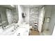 Updated bathroom with marble vanity and tiled shower at 10215 Regal Dr # 19, Largo, FL 33774