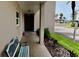 Private patio area with a bench, perfect for relaxing outdoors at 10215 Regal Dr # 19, Largo, FL 33774