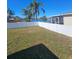 Large backyard with lake view and privacy fence at 4152 Banbury Cir, Parrish, FL 34219