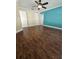 Spacious bedroom with hardwood floors and ceiling fan at 4152 Banbury Cir, Parrish, FL 34219