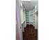 Large walk-in closet with custom shelving and light-colored wood floors at 4152 Banbury Cir, Parrish, FL 34219