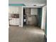 Laundry area with cabinets and water heater at 610 Fox St, Longboat Key, FL 34228