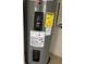 Rheem water heater with energy guide sticker at 610 Fox St, Longboat Key, FL 34228