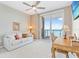 Bright bedroom with water views, comfortable sofa and work space at 920 N Osceola Ave # 604, Clearwater, FL 33755