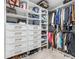 Large walk-in closet with custom shelving and drawers at 920 N Osceola Ave # 604, Clearwater, FL 33755
