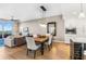 Open concept dining area with rustic wood table at 920 N Osceola Ave # 604, Clearwater, FL 33755