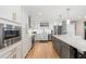 Modern kitchen with stainless steel appliances and white shaker cabinets at 920 N Osceola Ave # 604, Clearwater, FL 33755
