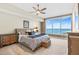Main bedroom with water view and comfortable bed at 920 N Osceola Ave # 604, Clearwater, FL 33755
