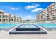 Inviting pool and spa with blue tile accents at 920 N Osceola Ave # 604, Clearwater, FL 33755