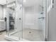 Large walk-in shower with bench seating and glass enclosure at 920 N Osceola Ave # 604, Clearwater, FL 33755