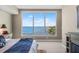 Bedroom with stunning water view and fireplace at 920 N Osceola Ave # 604, Clearwater, FL 33755