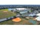 Aerial view of community featuring school, fields, and playground at 6266 Triple Tail Ct # 103, Lakewood Ranch, FL 34202