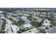 Aerial view of townhomes community with pool and lake at 6266 Triple Tail Ct # 103, Lakewood Ranch, FL 34202