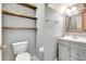 Small bathroom with floating vanity and shelves at 6266 Triple Tail Ct # 103, Lakewood Ranch, FL 34202