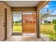 Screened patio with backyard view at 6266 Triple Tail Ct # 103, Lakewood Ranch, FL 34202