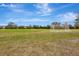 Soccer field with goal and trees under a blue sky at 6266 Triple Tail Ct # 103, Lakewood Ranch, FL 34202