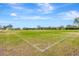 Soccer field with goals under a bright blue sky at 6266 Triple Tail Ct # 103, Lakewood Ranch, FL 34202