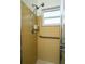 Shower stall with yellow tile walls and grab bar at 9205 40Th N Way # 5, Pinellas Park, FL 33782