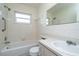 Clean bathroom featuring a bathtub, toilet and sink at 9205 40Th N Way # 5, Pinellas Park, FL 33782