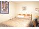 Bright bedroom featuring a double bed and a nightstand at 812 Walsingham Way, Valrico, FL 33594