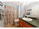 Bathroom with shower/tub, vanity, and linen storage at 11847 Dunster Ln, Parrish, FL 34219