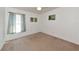 Well-lit bedroom with ceiling fan and window at 11847 Dunster Ln, Parrish, FL 34219