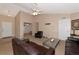 Living room features a vaulted ceiling, neutral colors, and plenty of light at 11847 Dunster Ln, Parrish, FL 34219