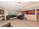 Spacious living room with vaulted ceilings and ample natural light at 11847 Dunster Ln, Parrish, FL 34219