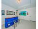 Fun basement bar with unique blue base and rustic wood top at 1280 Windy Bay Shl, Tarpon Springs, FL 34689