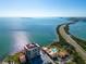 A unique waterfront community is featured in this aerial view showing a nearby causeway at 6372 Palma Del Mar S Blvd # Apt 307, St Petersburg, FL 33715