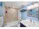 Well-lit bathroom featuring tub-shower with a white vanity at 6372 Palma Del Mar S Blvd # Apt 307, St Petersburg, FL 33715