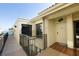 Exterior view of building with covered entry, tile roof, and unit number 307 at 6372 Palma Del Mar S Blvd # Apt 307, St Petersburg, FL 33715