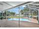 Relaxing pool and patio area with screened enclosure at 403 13Th Sw St, Ruskin, FL 33570