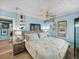 Bedroom with coastal bedding and a ceiling fan at 1422 Bayshore Rd, Ruskin, FL 33570