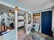 Open living area with a bunk bed and light blue walls at 1422 Bayshore Rd, Ruskin, FL 33570