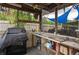 Outdoor kitchen with sink and prep area at 1422 Bayshore Rd, Ruskin, FL 33570