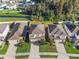 Aerial view of houses and street, showcasing community landscape at 10662 Hawks Landing Dr, Land O Lakes, FL 34638