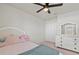 Spacious bedroom with a queen bed and dresser at 10662 Hawks Landing Dr, Land O Lakes, FL 34638