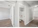Clean bathroom with tub, toilet and access to other rooms at 3051 27 E Ct, Palmetto, FL 34221