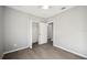 Bright bedroom with wood-look floors and spacious closet at 3051 27 E Ct, Palmetto, FL 34221
