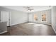 Bright living room with wood-look floors and access to exterior at 3051 27 E Ct, Palmetto, FL 34221