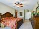 Spacious Primary bedroom with a king-size bed and ensuite bathroom at 5516 Luminar Pointe Ln, Apollo Beach, FL 33572