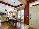 Bright dining room with hardwood floors and a chandelier at 5516 Luminar Pointe Ln, Apollo Beach, FL 33572