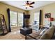 Bright office space with built in desk and comfortable seating at 5516 Luminar Pointe Ln, Apollo Beach, FL 33572