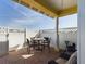 Brick patio with table, chairs, and seating area at 5516 Luminar Pointe Ln, Apollo Beach, FL 33572